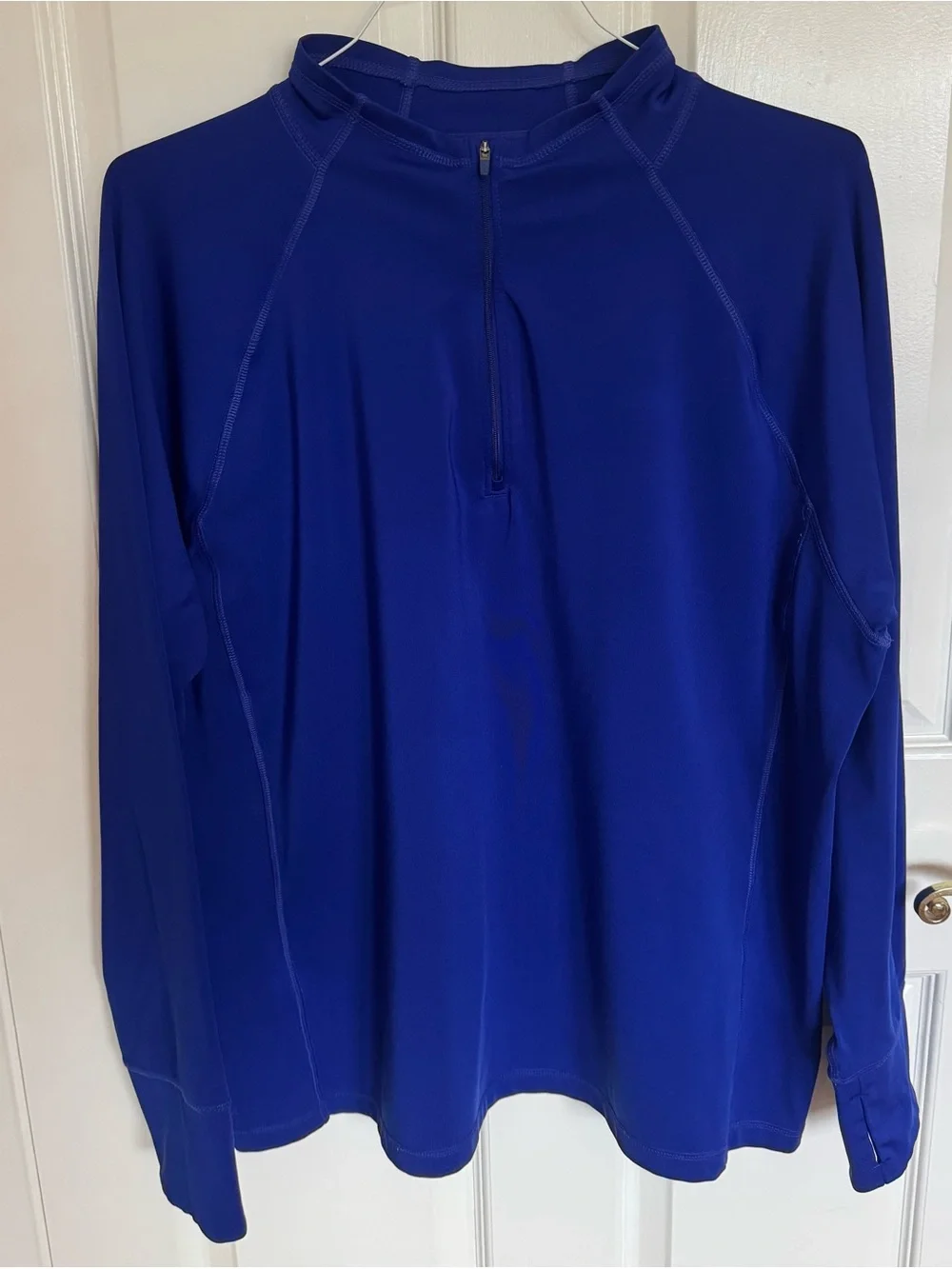 The North Face men's XL long sleeved thick dri-fit top in royal blue. EUC.